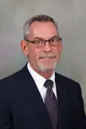 headshot of Kenneth Brookens